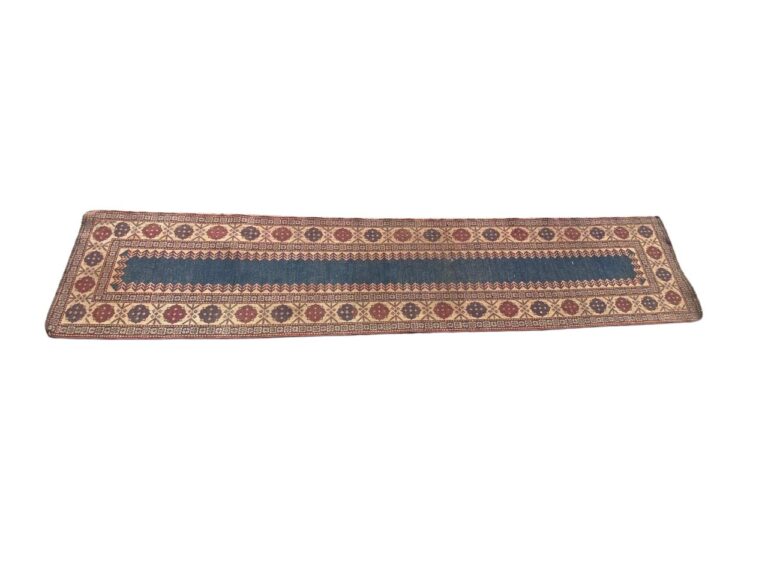 Geometric Runner Pattern Runner with blue centre and repeated geometric patterns on border ...